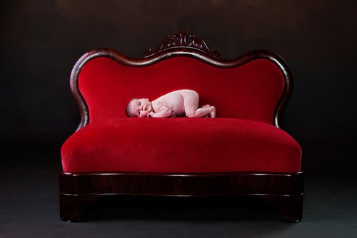 Baby on Red Sofa